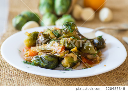 Brussel sprouts cooked with vegetables and spices Brussel sprouts cooked with vegetables and spices 120487846