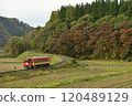Akita Inland Railway running through the autumn countryside 120489129