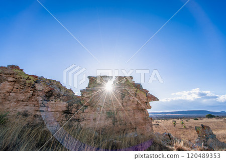 Sunset Through Natural Rock Window in Isalo National Park, Madagascar. 120489353