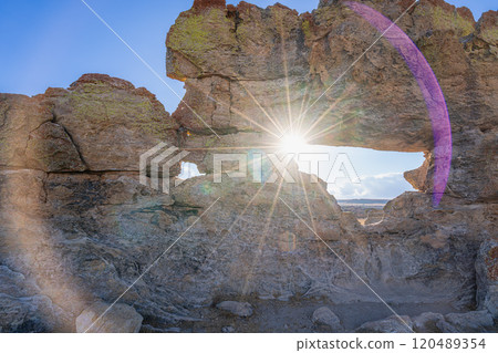 Sunset Through Natural Rock Window in Isalo National Park, Madagascar. 120489354