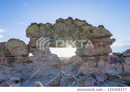 Sunset Through Natural Rock Window in Isalo National Park, Madagascar. 120489357