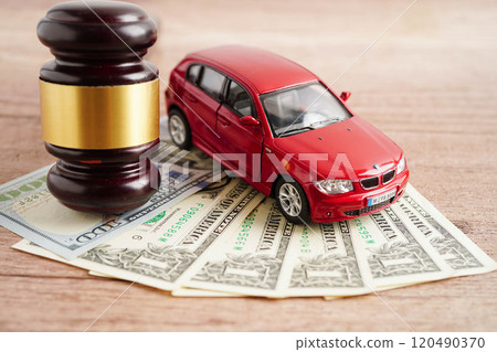 Car accident lawsuit and insurance, Judge hammer and money with car model. Car accident lawsuit and insurance, Judge hammer and money with car model. 120490370