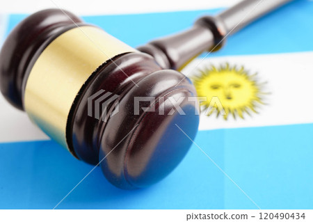 Argentine law, Legal, justice and agreement, wooden court gavel on flag. Argentine law, Legal, justice and agreement, wooden court gavel on flag. 120490434