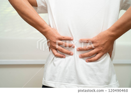 Asian man pain back muscle, spine and bone from accident. Asian man pain back muscle, spine and bone from accident. 120490468