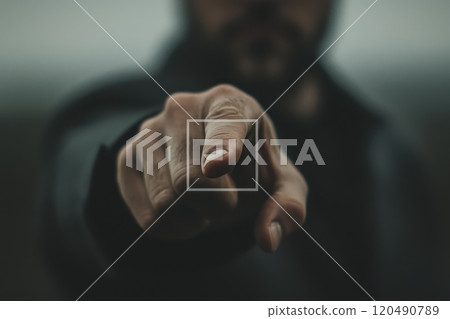 Man in Suit Pointing at Camera, confidence and authority. conveying a strong connection. Man in Suit Pointing at Camera, confidence and authority. conveying a strong connection. 120490789