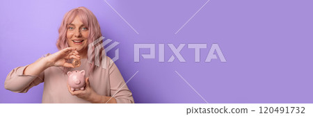 Young caucasian woman holding piggybank and bitcoin isolated on light lilac background inviting to come with hand. Young caucasian woman holding piggybank and bitcoin isolated on light lilac background inviting to come with hand. 120491732