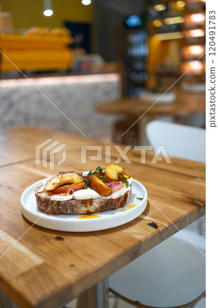 Breakfast sandwiches bread toast, bruschetta with grilled peaches and cheese. Healthy appetizer or snack. Food recipe background. Close up, 120491783