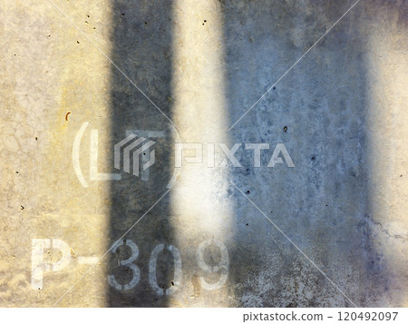 Bridge pier with natural light beam and shadow on surface. Bridge pier with natural light beam and shadow on surface. 120492097