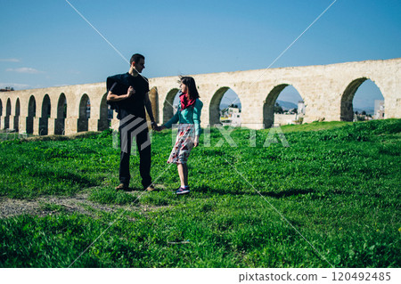 a couple in love near the ancient Kamares Aqueduct, Larnaca, Cyprus 120492485