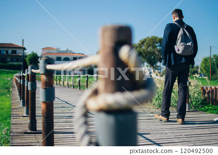 young man near the ancient Kamares Aqueduct, Larnaca, Cyprus 120492500