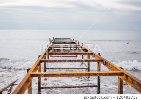 an old rusty pier on the seashore, Ayia Napa, Cyprus 120492712