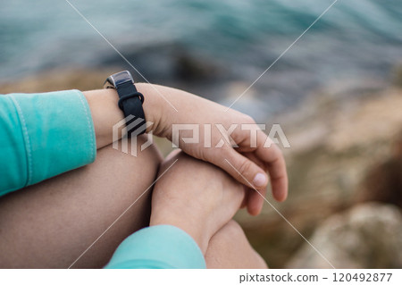 portrait of a young woman in bright clothes on the rocky coast of Ayia Napa, Cyprus 120492877