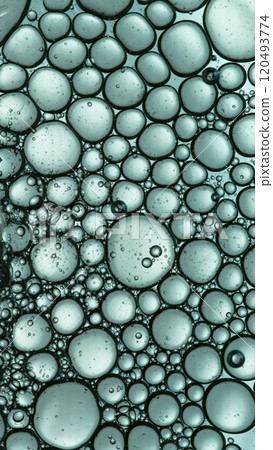 Macro Shot of Moving Oil Bubbles on Light Background Macro Shot of Moving Oil Bubbles on Light Background 120493774