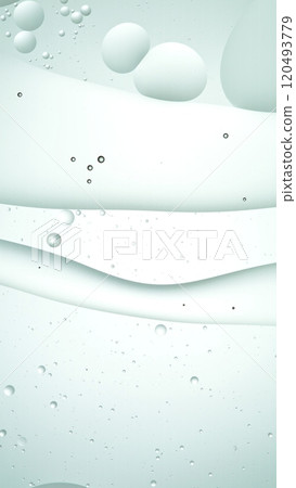 Macro Shot of Moving Oil Bubbles on Light Background 120493779