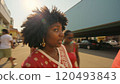 woman with a large, curly afro hairstyle 120493843