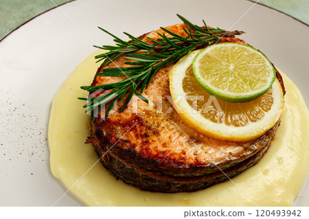 salmon steak, fried, mashed potatoes, top view, rosemary, lemon and lime, homemade, one serving, no people, salmon steak, fried, mashed potatoes, top view, rosemary, lemon and lime, homemade, one serving, no people, 120493942