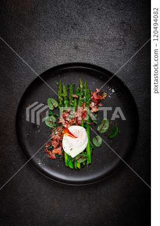 asparagus with poached egg and fried bacon, micro greens and spices, breakfast, homemade, no people, 120494082