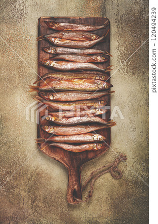 cold smoked capelin, on a wooden chopping board, no people, cold smoked capelin, on a wooden chopping board, no people, 120494239
