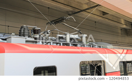 electric-rod pantograph of an electric train connecting the train to the overhead catenary wire. 120494853