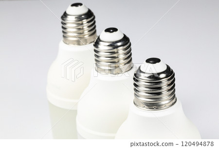 White LED bulb or light bulb with connector type e27 for energy saving isolated on white background. White LED bulb or light bulb with connector type e27 for energy saving isolated on white background. 120494878