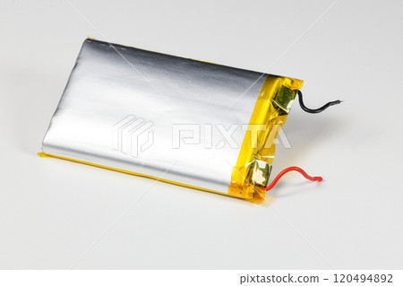 damaged swollen Lithium polymer, Li-ion batteries for mobile device isolated on white background. damaged swollen Lithium polymer, Li-ion batteries for mobile device isolated on white background. 120494892