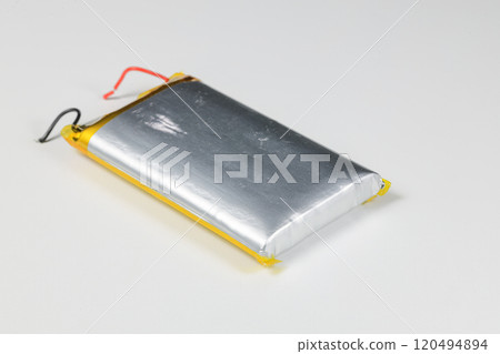 damaged swollen Lithium polymer, Li-ion batteries for mobile device isolated on white background. 120494894