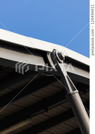 Close up detail of Steel structure hinges and pin connection joint on modern building. 120494911