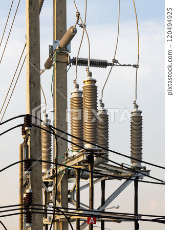 High voltage post, High voltage tower, show with high voltage construction and power lines. High voltage post, High voltage tower, show with high voltage construction and power lines. 120494925
