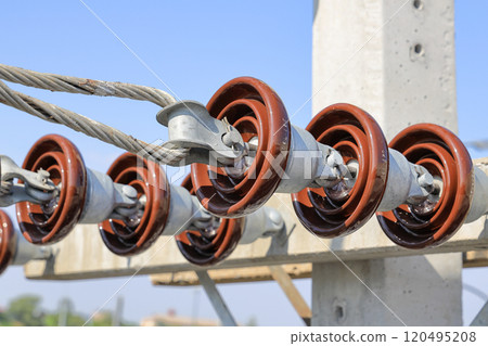 High voltage post, High voltage tower, show with high voltage construction and power lines. 120495208