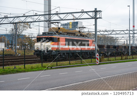 Old cargo locomotive on the Westpoort industrial site in Amsterdam, The Netherlands 120495713