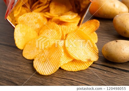Potato chips , delicious BBQ seasoning spicy for crips, thin slice deep fried snack fast food. 120498055