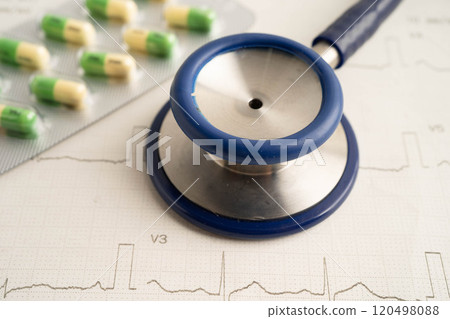 Stethoscope on electrocardiogram ECG with drug, heart wave, heart attack, cardiogram report. 120498088