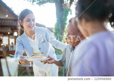 asian mother caring for family member asian mother caring for family member 120498860