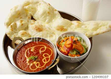 Nan and Indian curry 120499107