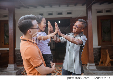 three generation family high five hand three generation family high five hand 120499383