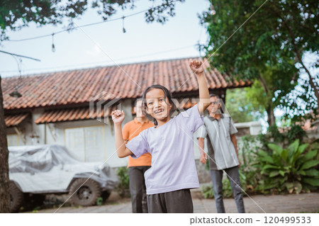 excited young kid playing with father and grandfather excited young kid playing with father and grandfather 120499533
