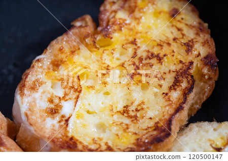 French toast being cooked in a frying pan (stock photo) French toast being cooked in a frying pan (stock photo) 120500147