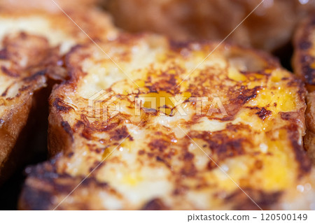 French toast being cooked in a frying pan (stock photo) French toast being cooked in a frying pan (stock photo) 120500149