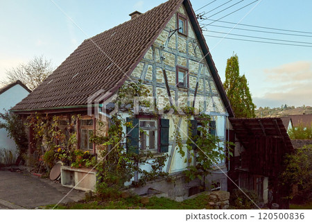 This Charming Vintage House is Beautifully Surrounded by Lush Greenery and Natures Beauty 120500836