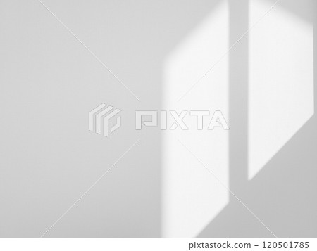 White wall background with light beam on the surface. 120501785