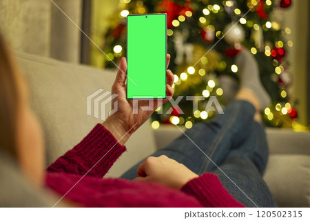 Person holding smartphone with green screen Person holding smartphone with green screen 120502315