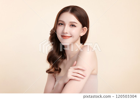 Beautiful young asian woman with clean fresh skin on beige background, Face care, Facial treatment, Cosmetology, beauty and spa, Asian women portrait. 120503304