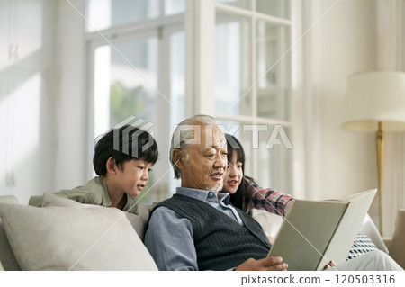 asian grandpa having a good time with grandchildren 120503316