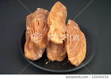Famous khaja of puri in black plate 120504210