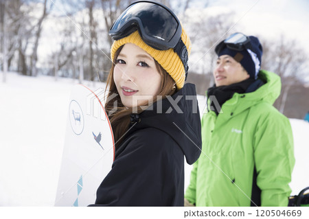 Men and women with snowboards Snowboard image 120504669
