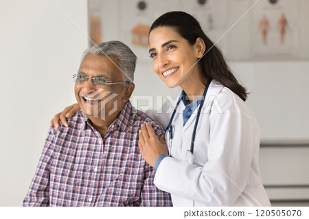 Portrait of optimistic older Indian man and young doctor Portrait of optimistic older Indian man and young doctor 120505070
