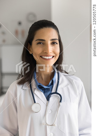 Smiling young Brazilian woman therapist vertical portrait Smiling young Brazilian woman therapist vertical portrait 120505778