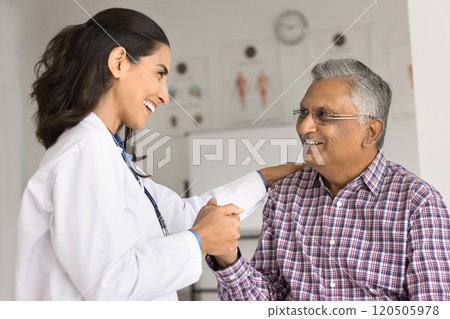 Cardiologist touch shoulder holding hand of older patient Cardiologist touch shoulder holding hand of older patient 120505978
