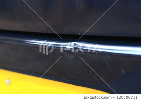 Dent on rear of car 120506711