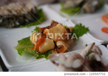 Fresh raw sea squirt served on a white plate Fresh raw sea squirt served on a white plate 120507732